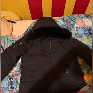 moose knuckle , black logo and fur , size medium